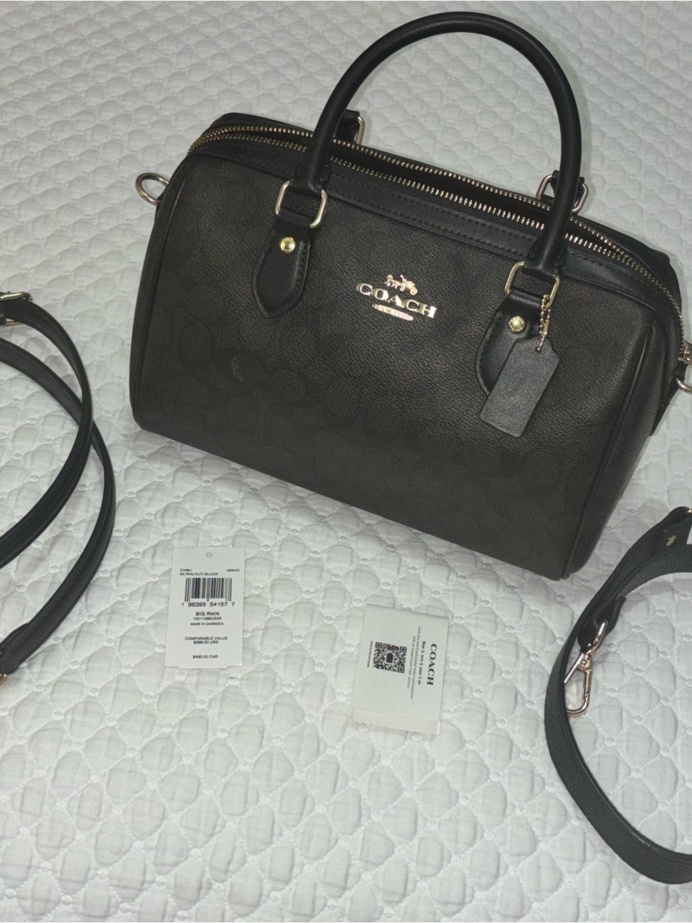 Coach Rowan in signature canvas (medium/regular size)